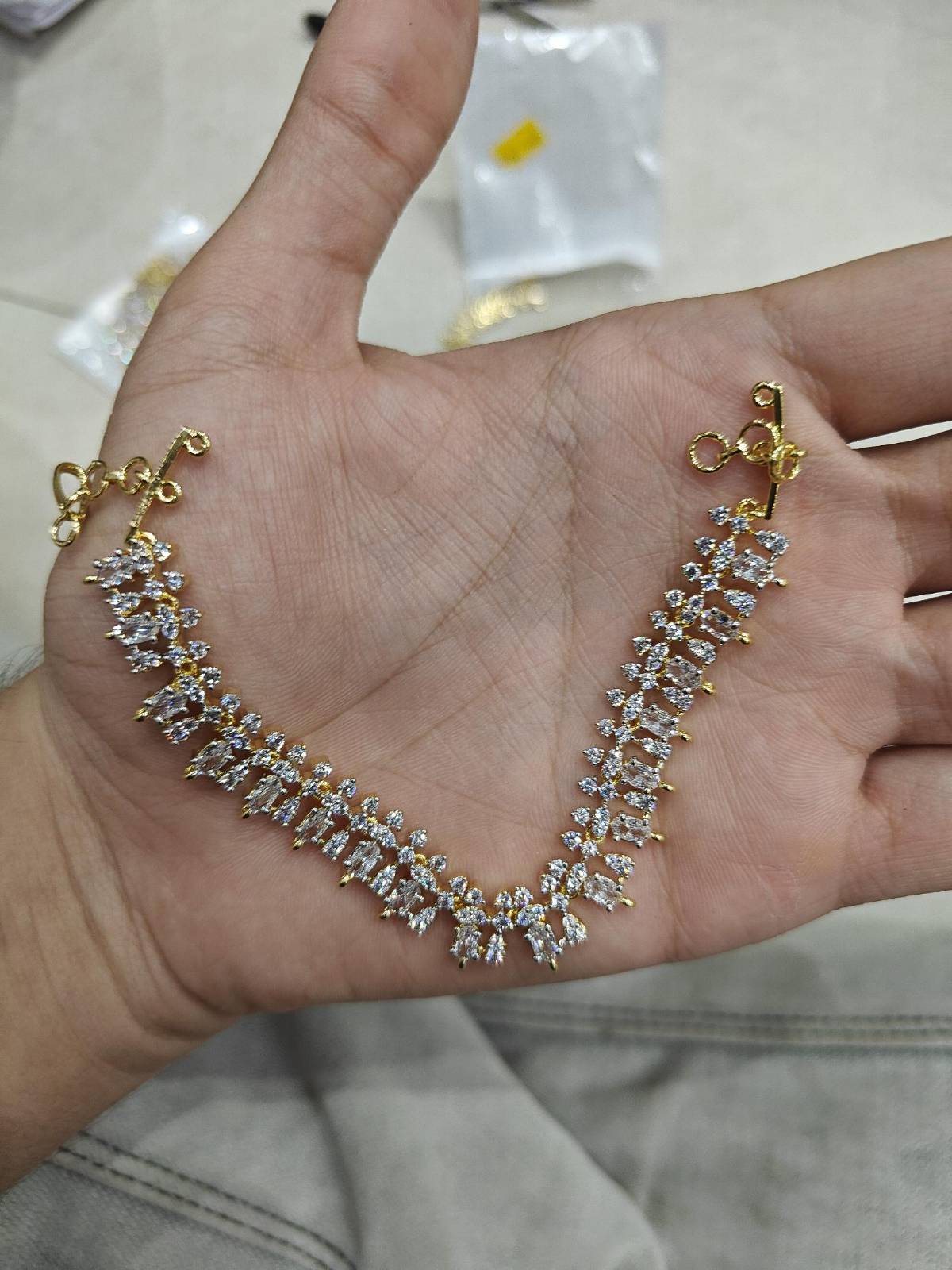 Navya Gilded Champaswaralu Ear Chains