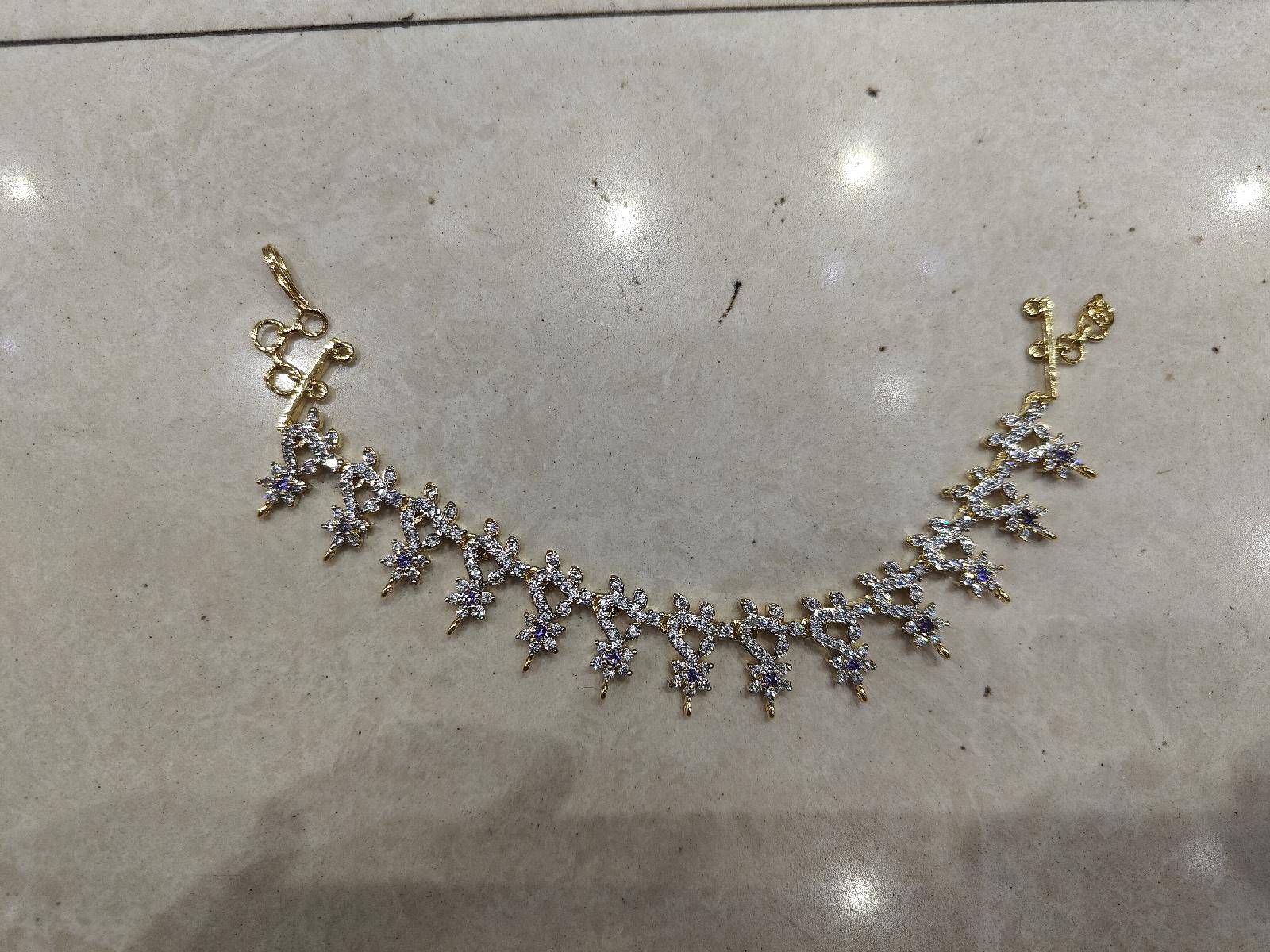 Charvi Gilded Champaswaralu Ear Chains